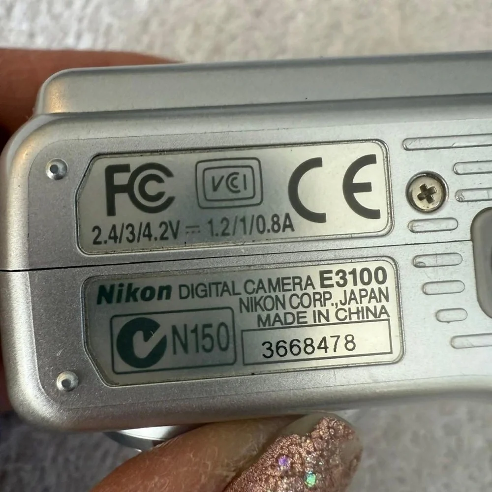 Nikon Coolpix 3100 Silver Digital Camera with Strap
